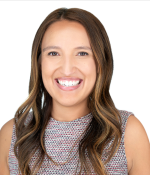 Woman with long brown hair smiling