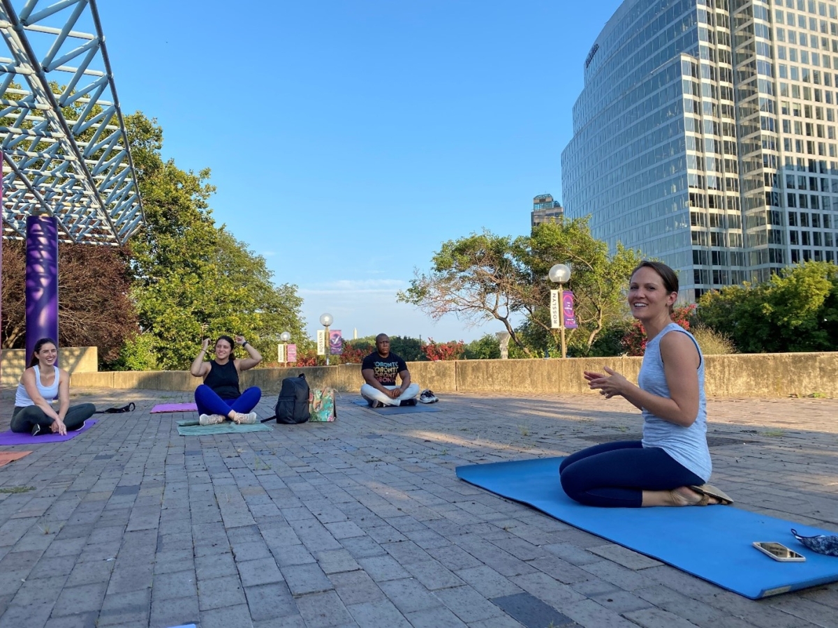 Christine Sherman Baker on a yoga mat