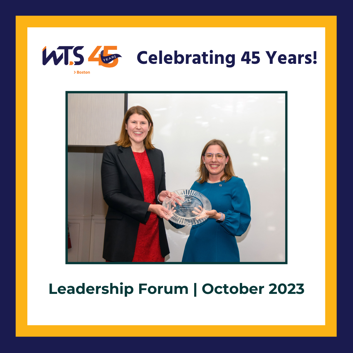 A photo of two women smiling and holding a glass plate award. The WTS Boston 45th anniverary logo is at the top next to the words Celebrating 45 years in blue. Below the photo reads Leadership Forum October 2023 in green. A blue and yellow border surrounds the entire post.