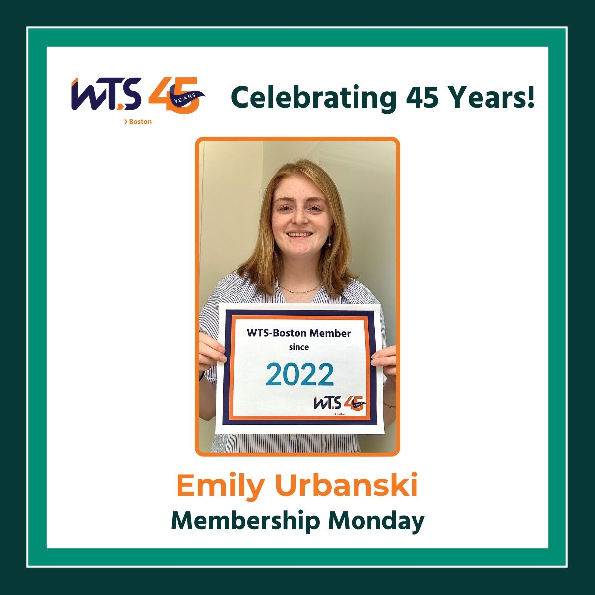 Young woman smiles at the camera holding a sign saying 2022. Above her photo reads celebrating 45 years. Below her photo says Emily Urbanski Membership Monday.