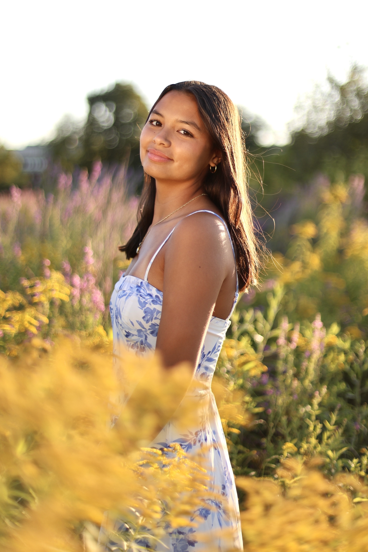 Female in a field with flowers