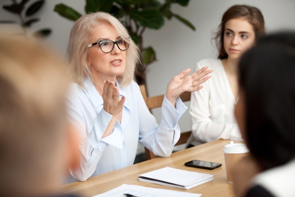 Woman mentoring during a meeting