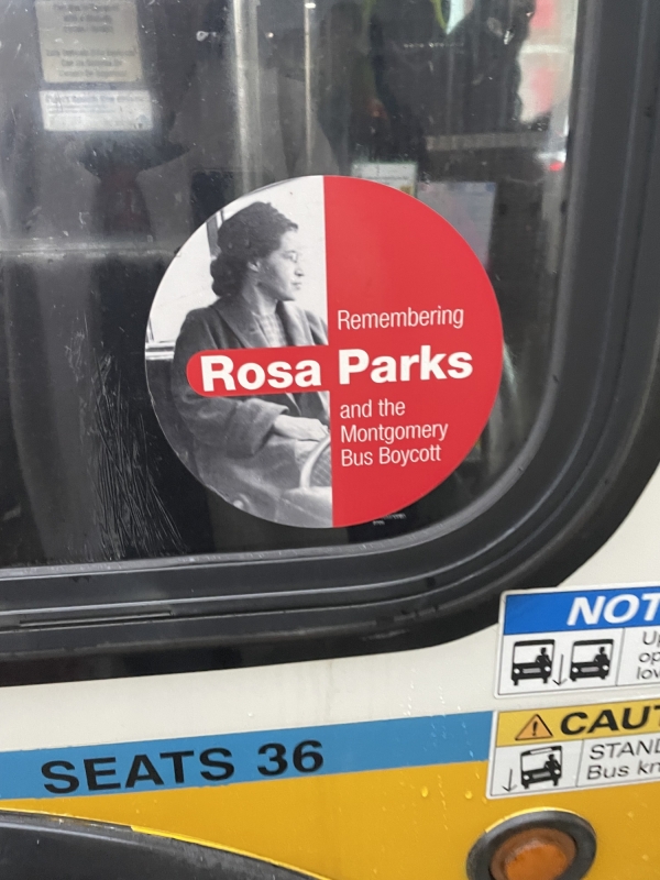 Sticker decal on a public bus honoring Rosa Parks