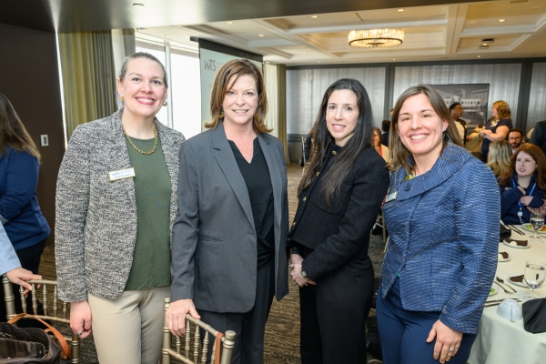 Photo of Speakers Amtrak VP Jennifer Mitchell and MassDOT Rail & Transit Administrator Meredith Slesinger with WTS-Boston President Sarah Bergman, and Past-Present and Luncheon Champion Gina Solman, taken on March 13, 2025 at the UMass Club in Boston.