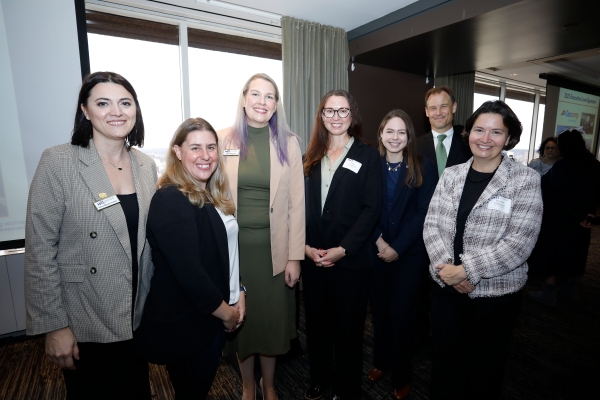 Photo of Moderator and Panelists with WTS-Boston leadership Sarah Bergman (WSP) and Selma Mandzo-Preldzic (VHB). Left to right: Selma, Lisa Chandler (City of Beverly), Sarah, Julia Campbell (City of Boston), Cassandra Gascon (MassDOT), Brad Rawson (City of Somerville), Brooke McKenna (City of Cambridge), taken on October 15, 2025 at the UMass Club in Boston.