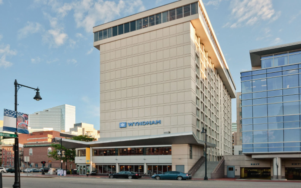 A streetview picture of the Wyndham Boston Beacon Hill Hotel facade, showing the name "Wyndham." 
