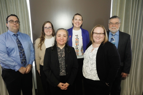 Photo of MassDOT Panelists Matthew Weidele, Kelsey Munns, Hanan Fouad, Alyson Bedard and Alex Bardow with WTS-Boston President Sarah Bergman taken on February 6, 2025 at the UMass Club in Boston.