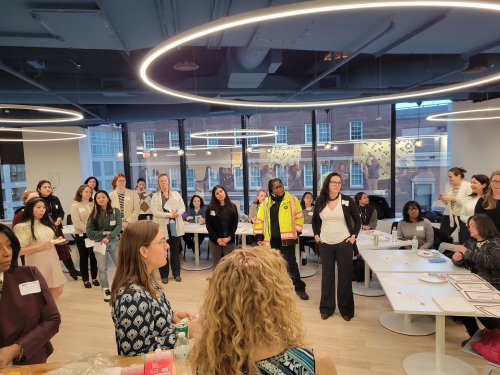 New members gather to learn about WTS-Boston, its committees, and how to get involved.