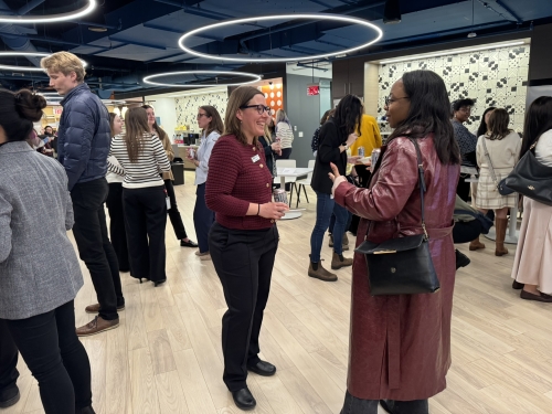 New members gather to learn about WTS-Boston, its committees, and how to get involved.