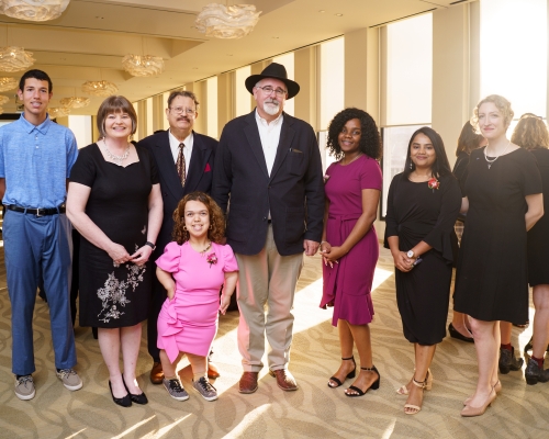 Haya's family, Kathy Phillips, Commissioner Jack Cagle, Carolina Graca, Sree Gudimella, and Sara Varvarigos 