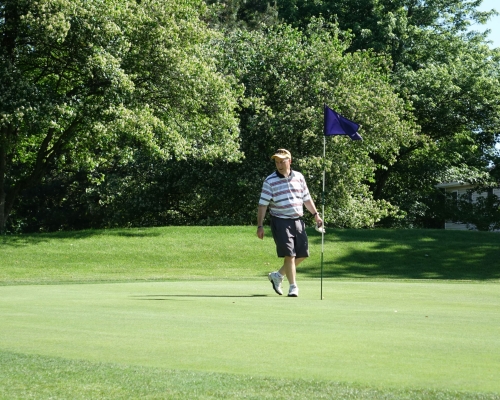 Anticipating a teammate's winning putt.