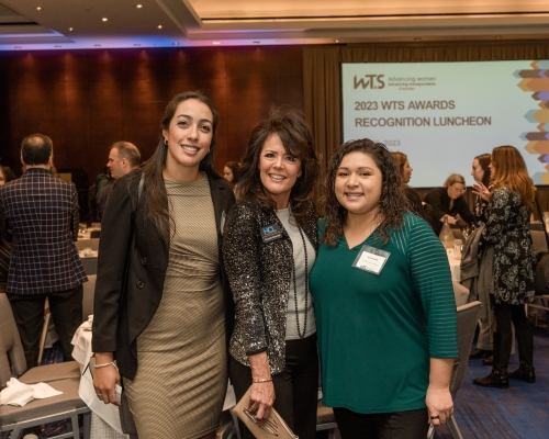 Three women smiling 