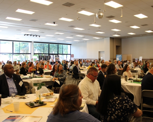 Room filled with conference participants
