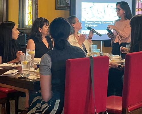 Chapter President Julia Jauregui speaks w/ Erin Haagenson