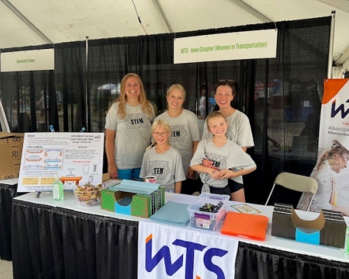 Photo of the WTS booth on STEM day at Iowa State Fair 2023