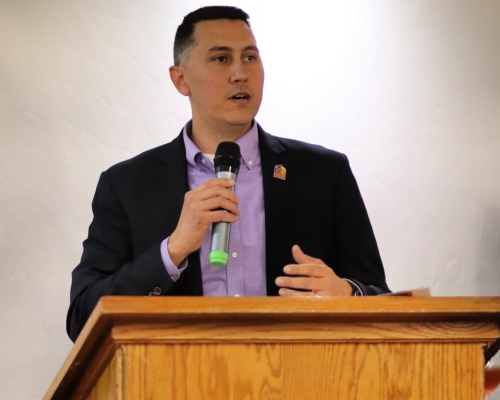 Man speaking at podium