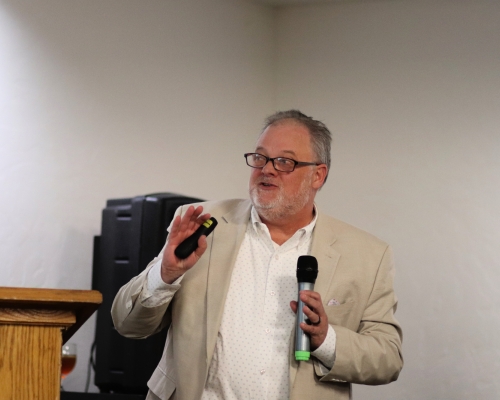 Man speaking at podium