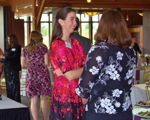 Guests mingling during the Networking Happy Hour