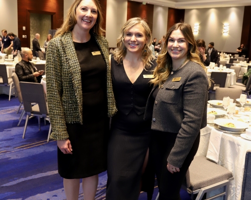 Three WTS members posing for a photo at the 2026 Luncheon
