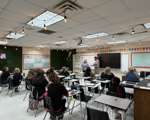 Mary Beth and Matt Bennett speaking to students