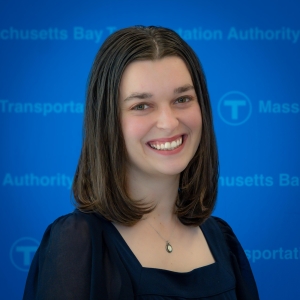 Woman with shoulder length brown hair smiling