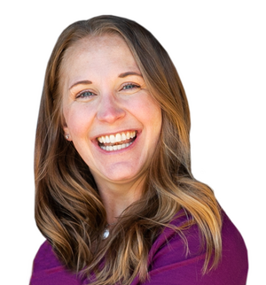 Headshot of woman smiling with brown hair and a purple blouse